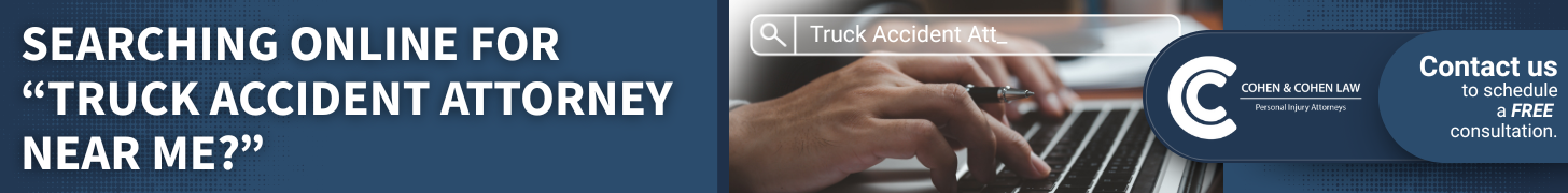 searching online for truck accident attorney near me img